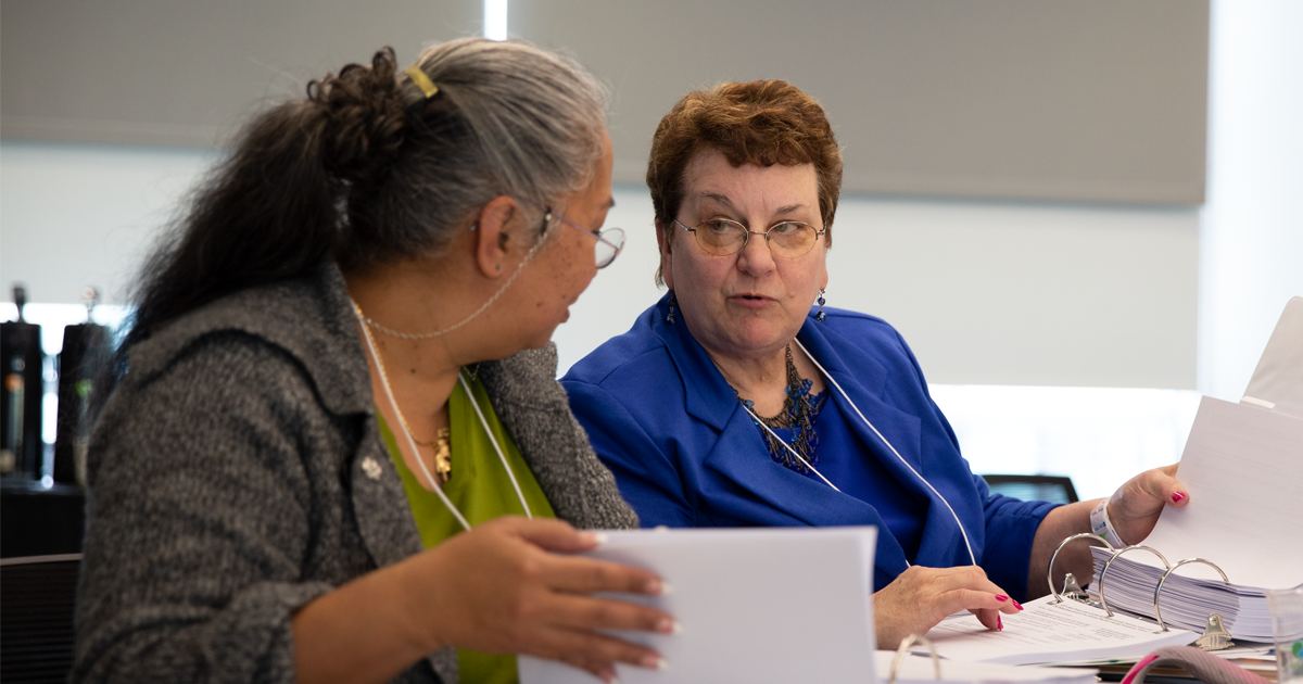 Adults collaborating